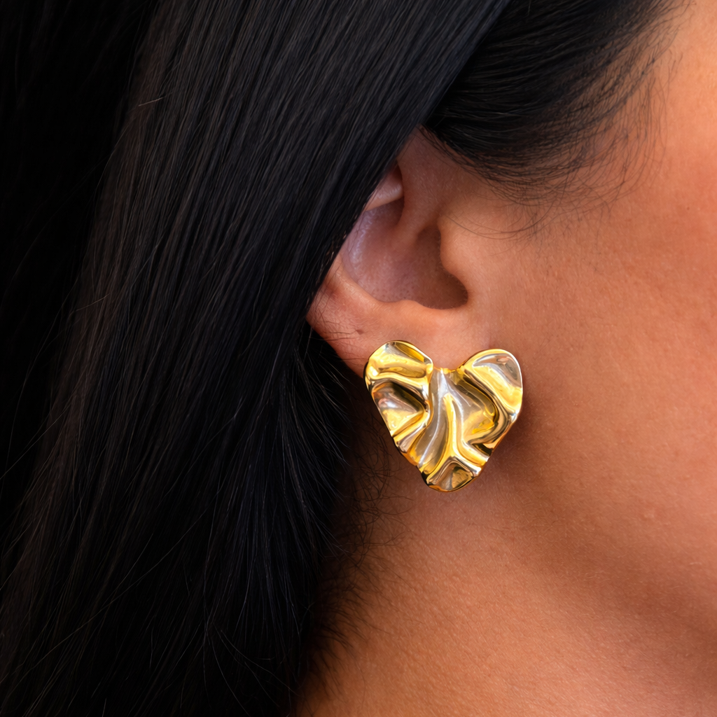 SCULPTED GOLD HEART STATEMENT STUDS